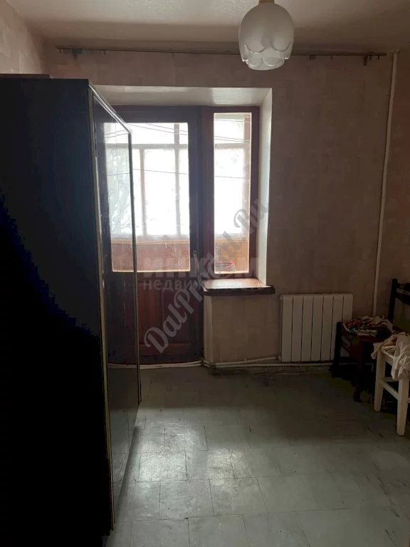 Продам 4-х комнатную квартиру с авт отоп в Центре города Луганск улица Коцюбинского