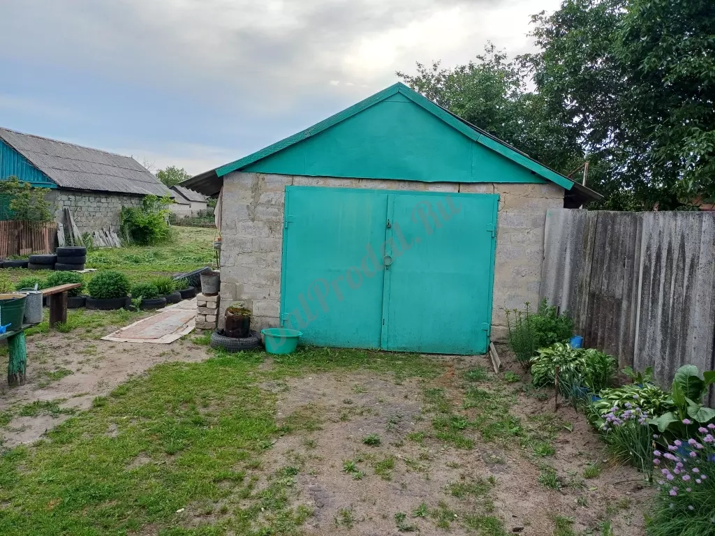 ПРОДАМ Шикарный участок в центре города с домом и гаражом